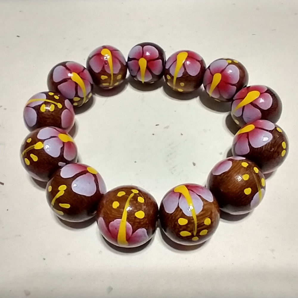 Hand painted wood beaded bracelet pink and yellow flowers on dark wood